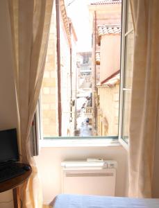 Koupelna v ubytování Miró Studio Apartments Dubrovnik + 37 fotografií