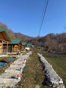a stone path in front of a building at Matesevo guest houses in Kolašin