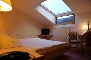 Llit o llits en una habitació de Hotel Köppeleck