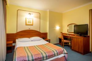 Posteľ alebo postele v izbe v ubytovaní Hotel Wersal
