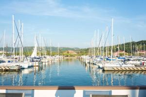 a bunch of boats docked in a marina at Floating house - Marina Relax in Portorož