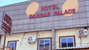 a hotel draken palace with a sign on it at HoTEL DARBAR PALACE in Dewās