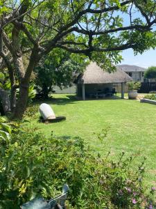 a yard with a house in the background at Villa Elizabeth - Fourways Gardens Sandton in Fourways