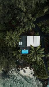 an overhead view of a resort with palm trees at South Point Villas Cerf Island in Cerf Island