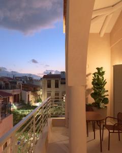 a balcony with a view of a city at Moshoviti Residence in Rethymno