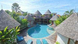 an aerial view of a villa with a swimming pool at Villa Manureva in Canggu