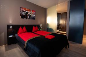Postel nebo postele na pokoji v ubytování Hotel Quers Inn