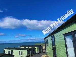 a view of the ocean from a building at Hendre Coed Isaf Caravan Park in Barmouth