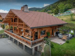 an overhead view of a log cabin with a roof at Chalet Sivara - OVO Network in Manigod