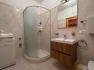 a bathroom with a shower and a sink at LHE Terrazza Alba in Bagno di Romagna