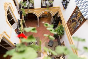 an overhead view of a hallway in a building at Hotel Abanico in Seville