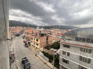a view of a city from a building at Depamia in Huaraz