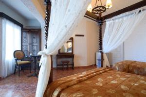 Voodi või voodid majutusasutuse Hotel Porto Perissa toas