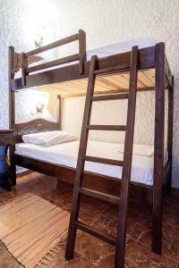 Voodi või voodid majutusasutuse Hotel Porto Perissa toas