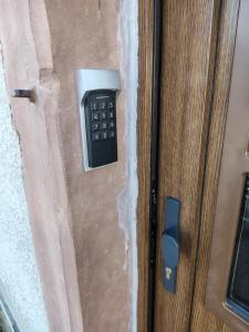 a door with a remote control sticking out of it at Ferienhaus St Martin in Schalkenmehren