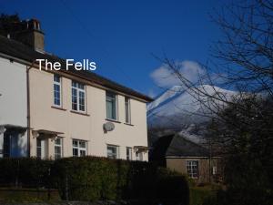 a house with the falls sign on top of it at The Fells in Keswick +10 photos