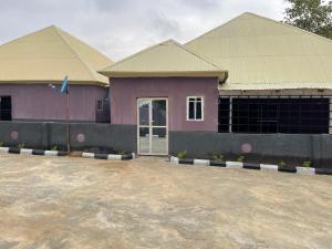 a house with a purple house with at FE Purple Gold Hotel in Abuja