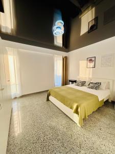 a bedroom with a large bed in a room at B1 Apartments Deluxe in Năvodari