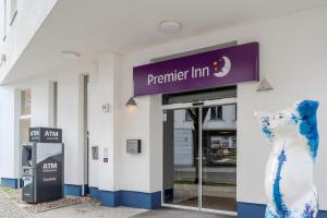 a store front with a statue of a polar bear outside at Premier Inn Berlin City Spittelmarkt in Berlin