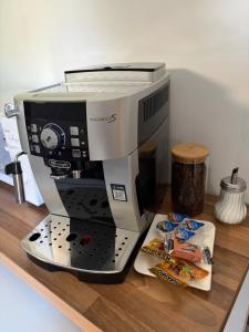 a coffee maker sitting on top of a counter at Casa Tua An der Weinstraße in Neustadt an der Weinstraße