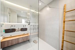 a bathroom with a sink and a shower at Casa Tucan Javea, luxury close to Arenal Beach in Jávea