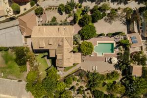 an overhead view of a house with a yard at Estrellas Luxury Villas in Svoronata