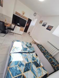 a bedroom with a bed covered in stained glass at Casa D'oro1700 - Old town Koper in Koper