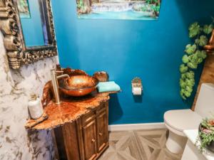 a bathroom with a sink and a toilet at The Retreat in Goole +26 photos