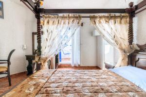 Voodi või voodid majutusasutuse Hotel Porto Perissa toas