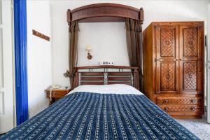 Voodi või voodid majutusasutuse Hotel Porto Perissa toas