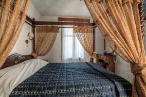 Voodi või voodid majutusasutuse Hotel Porto Perissa toas