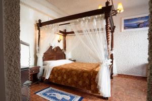 Voodi või voodid majutusasutuse Hotel Porto Perissa toas