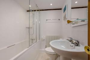 a bathroom with a sink and a toilet and a shower at 3 Bed in Wareham oc-dc129 in Turners Puddle +13 photos
