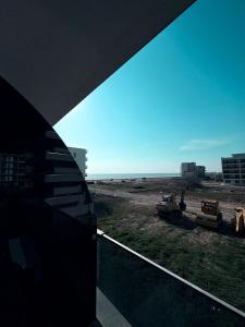 a view of a desert from a window of a building at Tower Apartments A6 in Năvodari