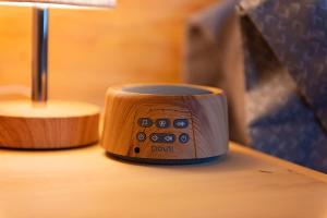 a wooden cup sitting on top of a table at Peggers Cabin Luxury Rustic Tiny Cabin Spa in Chattanooga +29 photos