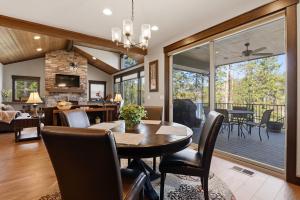 a dining room and living room with a table and chairs at Blanchard Bliss in Blanchard
