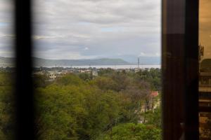 a view of a city from a window at Nivaro Homes in Nakuru