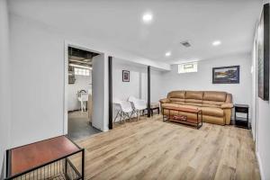 a living room with a couch and a table at 113 Madison Ave, Cuyahoga Falls in Cuyahoga Falls