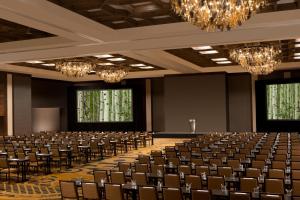 an empty banquet hall with chairs and chandeliers at Signia by Hilton La Cantera Resort & Spa in San Antonio +152 photos