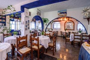 Restoran või mõni muu söögikoht majutusasutuses Hotel Porto Perissa