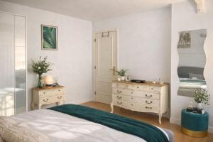 a bedroom with a bed and a dresser at Luxury Double Room Marbella Center in Marbella
