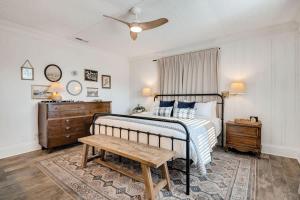 a bedroom with a bed and a wooden table at 1- Lookout Mountain Cottage in Lookout Mountain