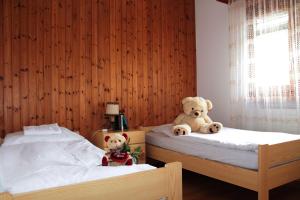 Voodi või voodid majutusasutuse Appartements Monte Rosa toas