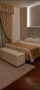 a bedroom with two beds and a window at Villa Il Matto con spa idromassaggio e sauna in Arezzo +59 photos