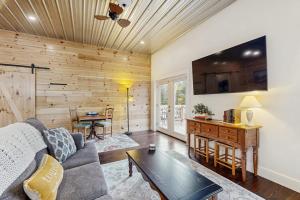 a living room with a couch and a table at Valley Vista Vacay 2 in Littleton