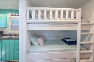 a bunk bed in a childs bunk room at Sophie Cabin National Forest Tiny Cabin in Chattanooga