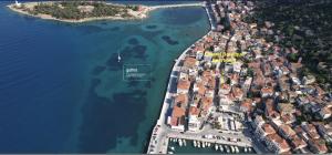 an aerial view of a small island in the water at Central Boutique Apartment Gythio in Gythio