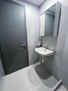 a bathroom with a shower and a sink and a mirror at Sidari Vibes Aparthotel in Sidari +36 photos