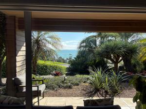 a view of the ocean from the patio of a house at The Beach House in Red Beach