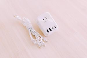 a white nintendo wii game controller sitting on a table at Chic Nakasu Apartment Perfect for 2 Guests in Fukuoka